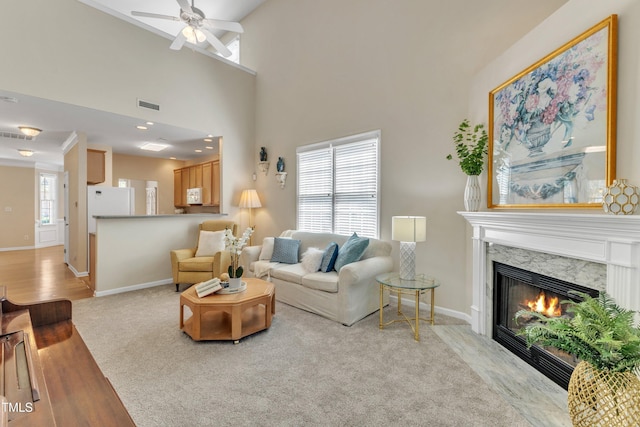 9005 River Estates Dr, Knightdale, NC 27545 - living room featuring baseboards, ceiling fan, visible vents, and a fireplace