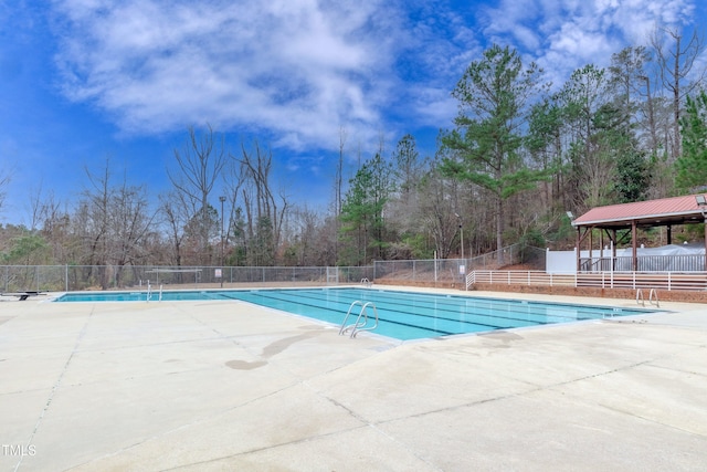 9005 River Estates Dr, Knightdale, NC 27545 - pool with a patio and fence
