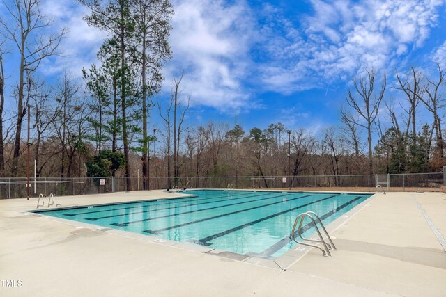 9005 River Estates Dr, Knightdale, NC 27545 - pool with fence and a patio