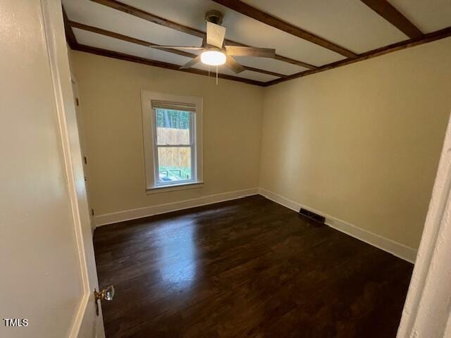 906 Camden Ave, Durham, NC 27701 - spare room featuring dark wood finished floors, ornamental molding, ceiling fan, and beam ceiling