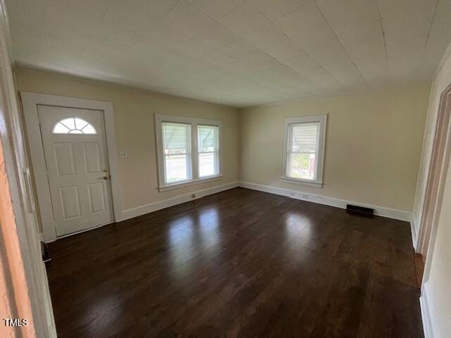 906 Camden Ave, Durham, NC 27701 - foyer entrance featuring dark wood finished floors and baseboards