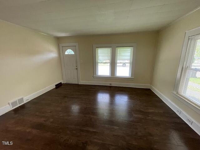 906 Camden Ave, Durham, NC 27701 - foyer with healthy amount of natural light and wood finished floors