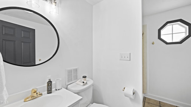 114 Barnhill St, Durham, NC 27707 - bathroom with tile patterned floors, vanity, and a shower