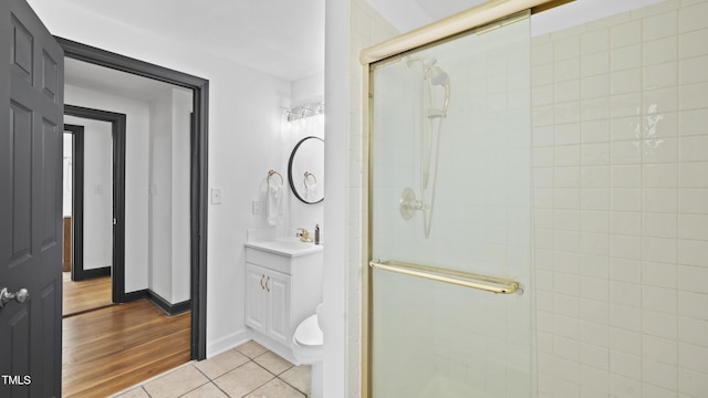114 Barnhill St, Durham, NC 27707 - bathroom with a stall shower, vanity, and tile patterned floors