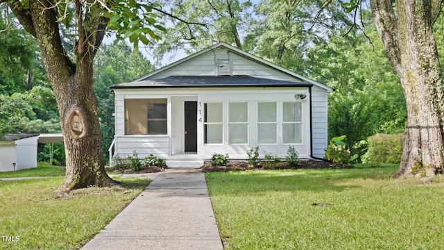 114 Barnhill St, Durham, NC 27707 - view of front of home featuring a front lawn