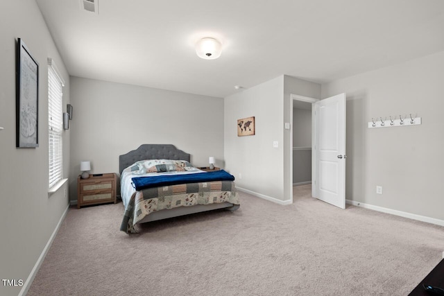 bedroom featuring carpet, visible vents, and baseboards