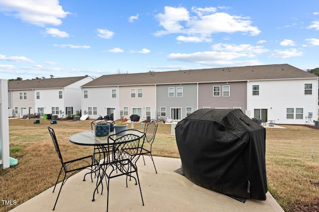 view of patio with area for grilling and a residential view