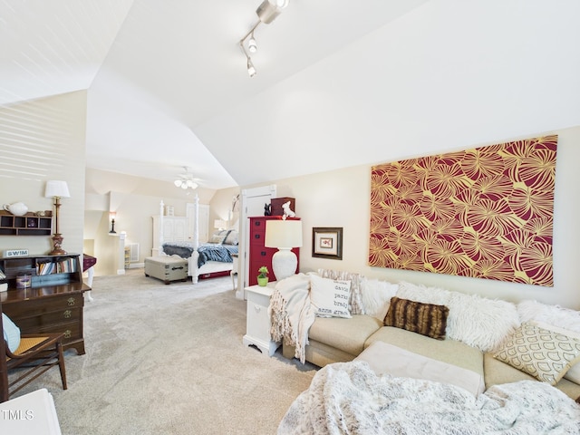carpeted living room with lofted ceiling
