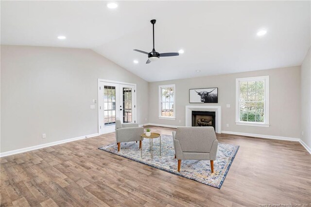 1429 Pocosin Rd, Winterville, NC 28590 - living room with wood finished floors, plenty of natural light, lofted ceiling, and ceiling fan
