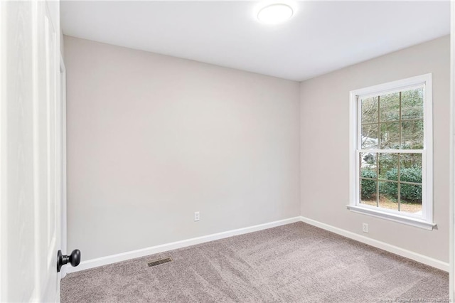 1429 Pocosin Rd, Winterville, NC 28590 - carpeted spare room with baseboards and visible vents