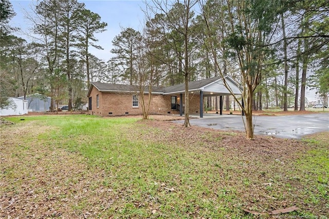 1429 Pocosin Rd, Winterville, NC 28590 - view of yard featuring an attached carport