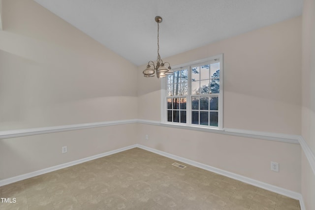 unfurnished dining area with baseboards, a chandelier, and visible vents