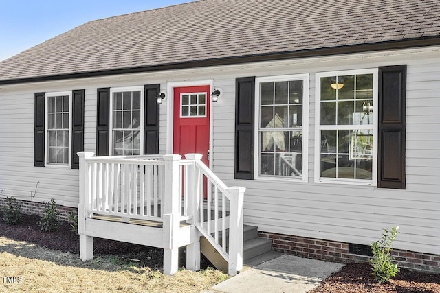176 Clear Water Dr, Smithfield, NC 27577 - entrance to property with a shingled roof and crawl space