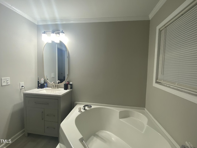 176 Clear Water Dr, Smithfield, NC 27577 - full bath with a bath, vanity, ornamental molding, wood finished floors, and baseboards