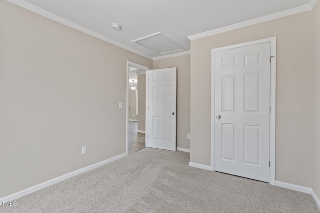 176 Clear Water Dr, Smithfield, NC 27577 - unfurnished bedroom with carpet flooring, baseboards, ornamental molding, and attic access