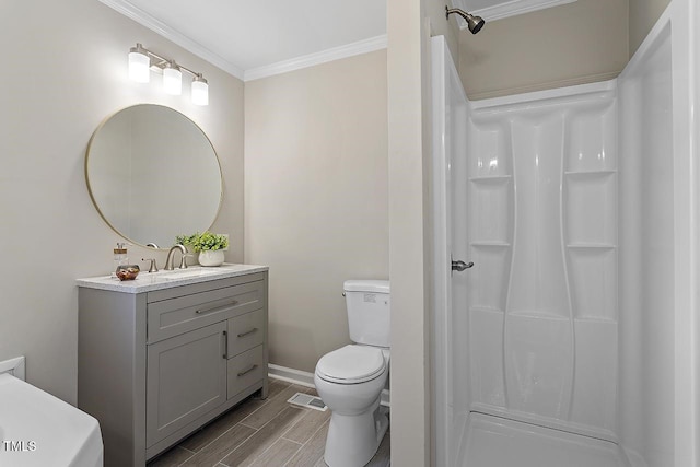 176 Clear Water Dr, Smithfield, NC 27577 - bathroom with vanity, toilet, wood finish floors, a shower, and crown molding