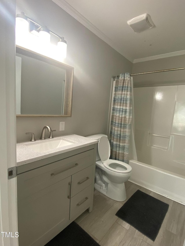 176 Clear Water Dr, Smithfield, NC 27577 - bathroom featuring ornamental molding, toilet, vanity, shower / bath combo, and wood finished floors