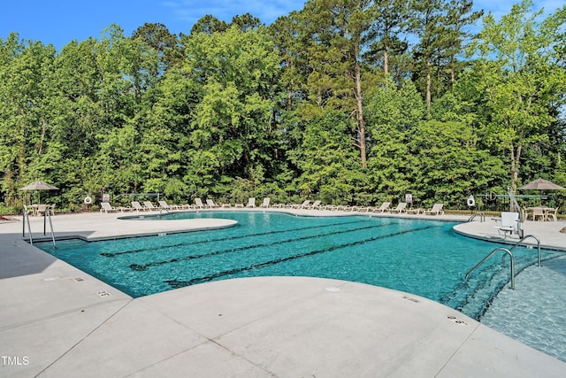 community pool with a patio