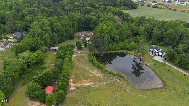 5237 Christian Light Rd, Fuquay Varina, NC 27526 - aerial overview of property's location with a nearby body of water and a forest