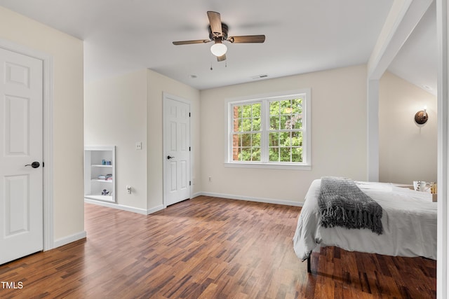 5237 Christian Light Rd, Fuquay Varina, NC 27526 - bedroom featuring wood finished floors, baseboards, ceiling fan, and beamed ceiling