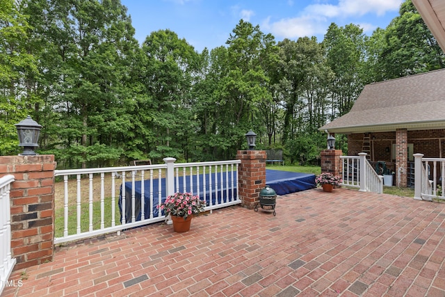 5237 Christian Light Rd, Fuquay Varina, NC 27526 - view of patio / terrace featuring view of scattered trees