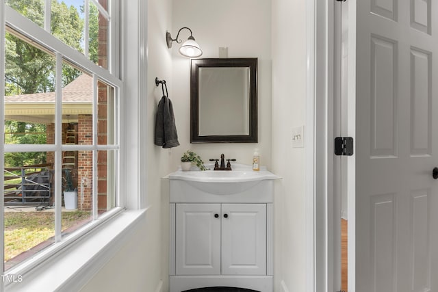 5237 Christian Light Rd, Fuquay Varina, NC 27526 - bathroom with vanity and healthy amount of natural light