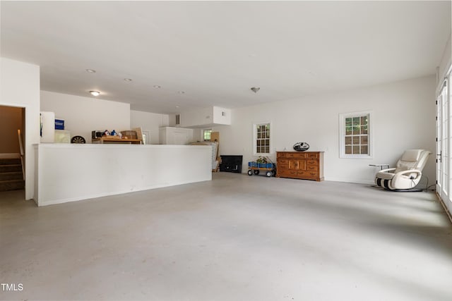 5237 Christian Light Rd, Fuquay Varina, NC 27526 - living area featuring concrete floors and baseboards