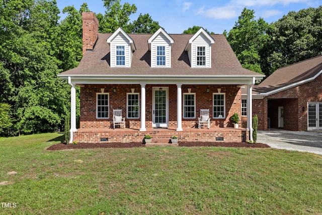 5237 Christian Light Rd, Fuquay Varina, NC 27526 - cape cod house with crawl space, a chimney, brick siding, covered porch, and a front yard