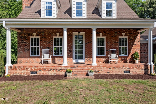 5237 Christian Light Rd, Fuquay Varina, NC 27526 - view of front of home with crawl space, covered porch, brick siding, a front lawn, and roof with shingles