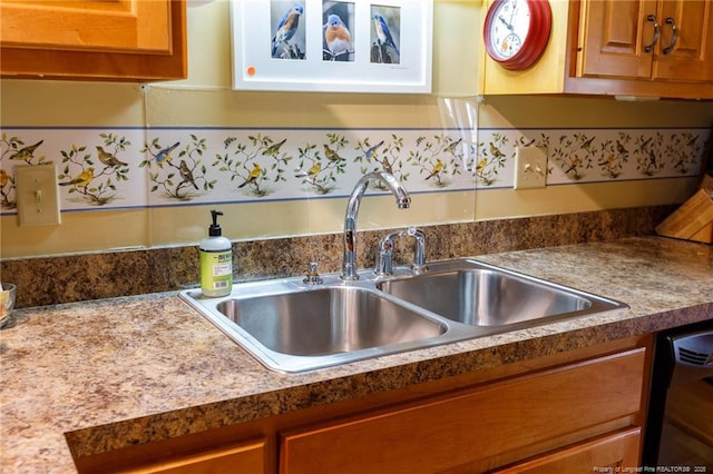 2427 Colgate Dr, Fayetteville, NC 28304 - kitchen featuring a sink and brown cabinets