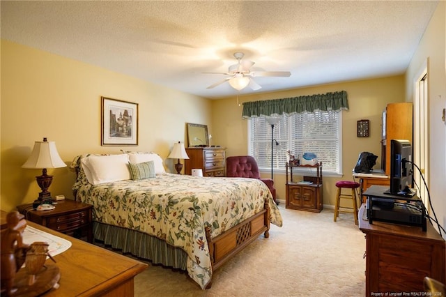 2427 Colgate Dr, Fayetteville, NC 28304 - bedroom with light colored carpet, ceiling fan, baseboards, and a textured ceiling
