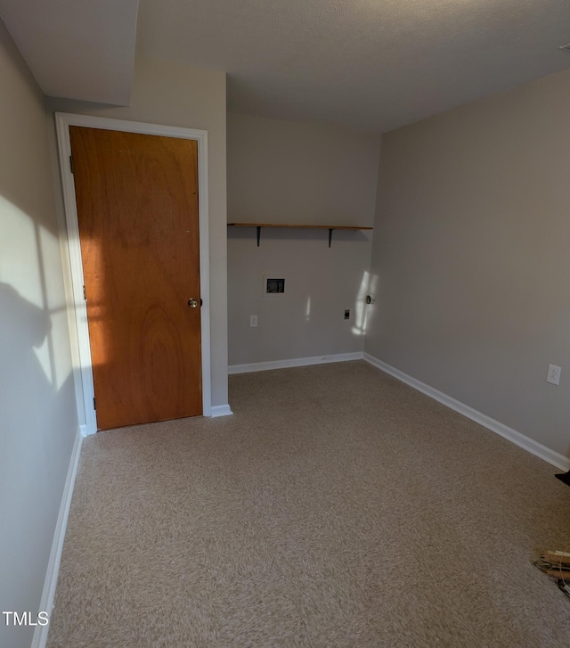 laundry room with baseboards, laundry area, and carpet flooring