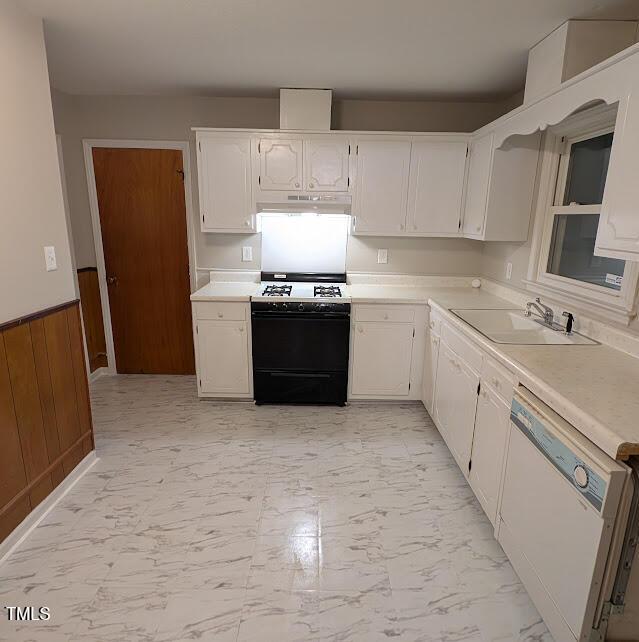 5240 Chesapeake Rd, Fayetteville, NC 28311 - kitchen featuring range with gas stovetop, a sink, dishwasher, light marble finish flooring, and light countertops