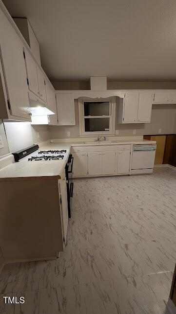 5240 Chesapeake Rd, Fayetteville, NC 28311 - kitchen with dishwasher, white cabinets, and light marble finish flooring