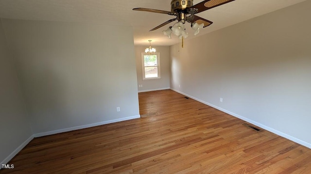 5240 Chesapeake Rd, Fayetteville, NC 28311 - unfurnished room with a ceiling fan, a chandelier, and baseboards