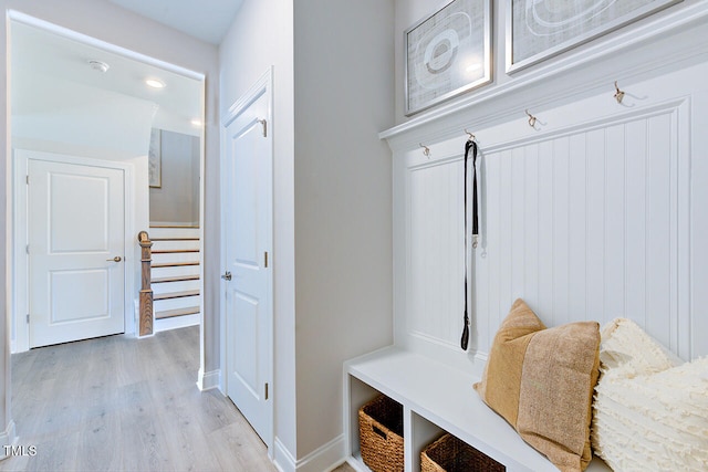 mudroom with light wood finished floors