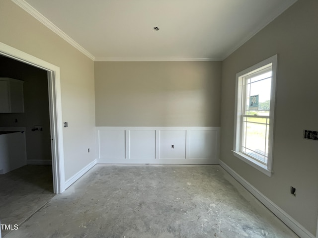 508 S Vance St, Fremont, NC 27830 - unfurnished dining area featuring ornamental molding, healthy amount of natural light, and baseboards