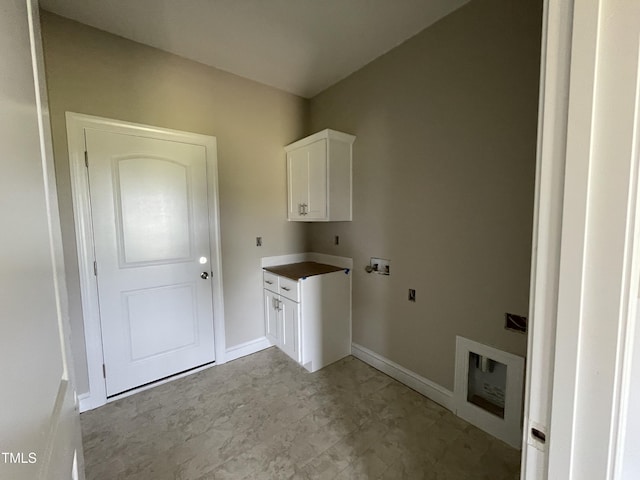 508 S Vance St, Fremont, NC 27830 - laundry room featuring hookup for a washing machine, cabinet space, hookup for an electric dryer, and baseboards