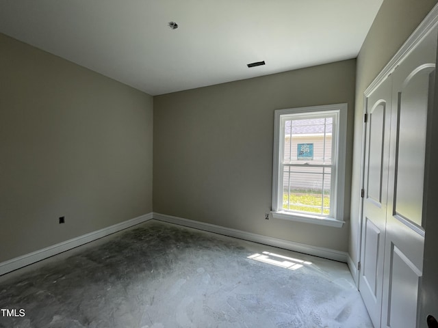 508 S Vance St, Fremont, NC 27830 - spare room with concrete floors and baseboards
