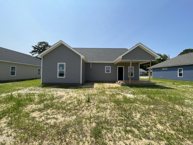 508 S Vance St, Fremont, NC 27830 - view of front of property with a front yard and roof with shingles