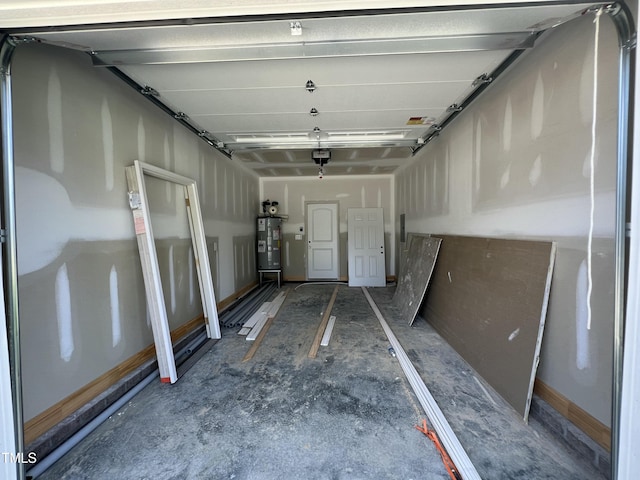 508 S Vance St, Fremont, NC 27830 - garage featuring water heater and a garage door opener