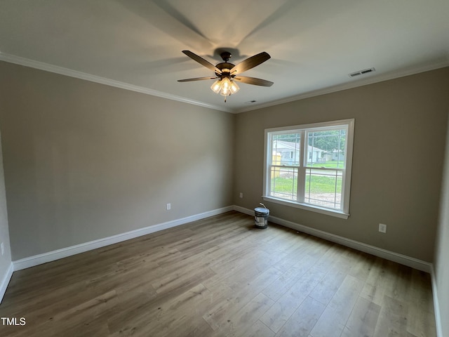 508 S Vance St, Fremont, NC 27830 - unfurnished room with a ceiling fan, wood finished floors, and ornamental molding