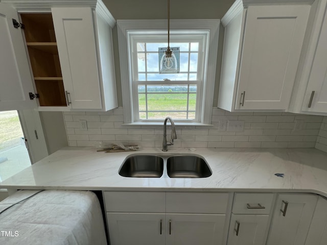 508 S Vance St, Fremont, NC 27830 - kitchen featuring white cabinetry, backsplash, open shelves, and decorative light fixtures