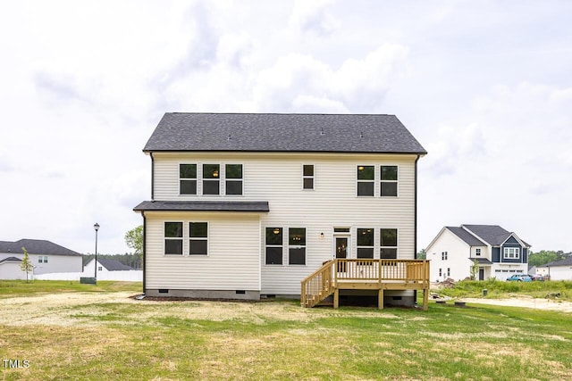 back of house with a deck, a yard, and crawl space