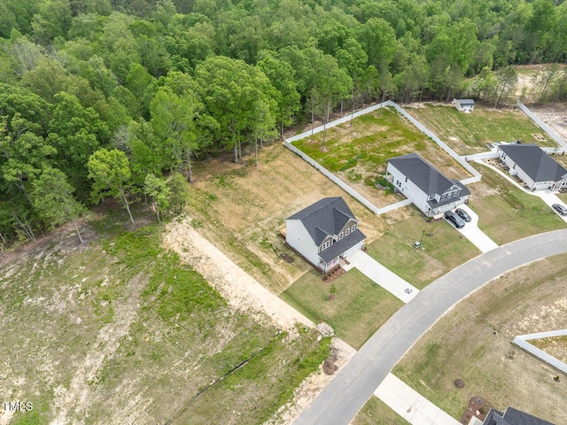 aerial view featuring a view of trees