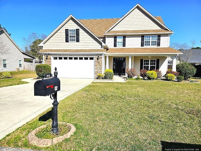 craftsman-style house with a front yard, roof with shingles, concrete driveway, an attached garage, and a porch