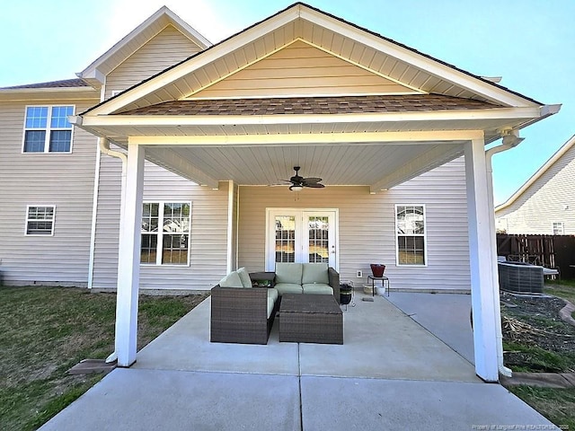 view of patio featuring fence, ceiling fan, outdoor lounge area, and central AC unit