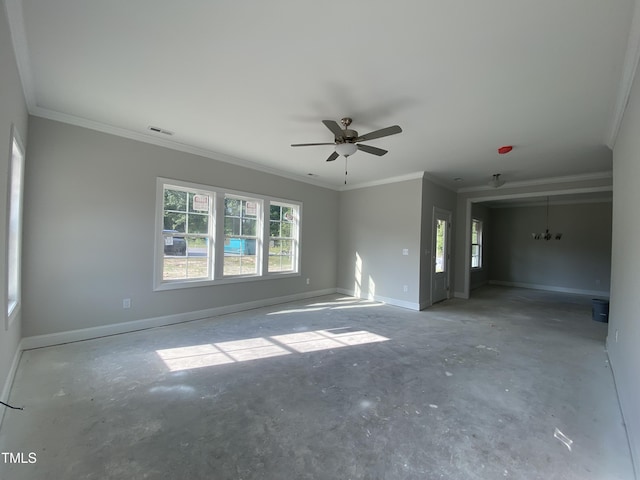 empty room featuring ceiling fan, visible vents, ornamental molding, and a healthy amount of sunlight