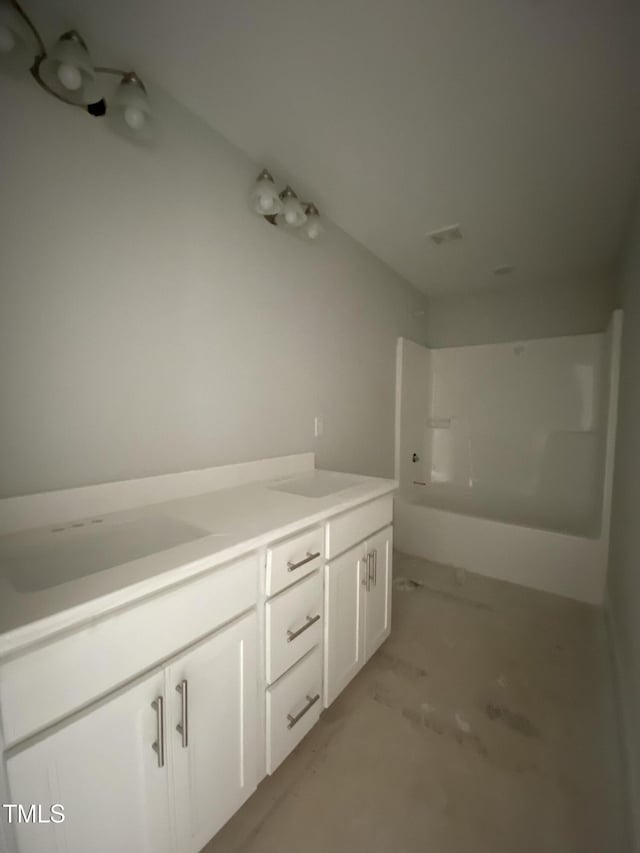 bathroom featuring vanity and tub / shower combination