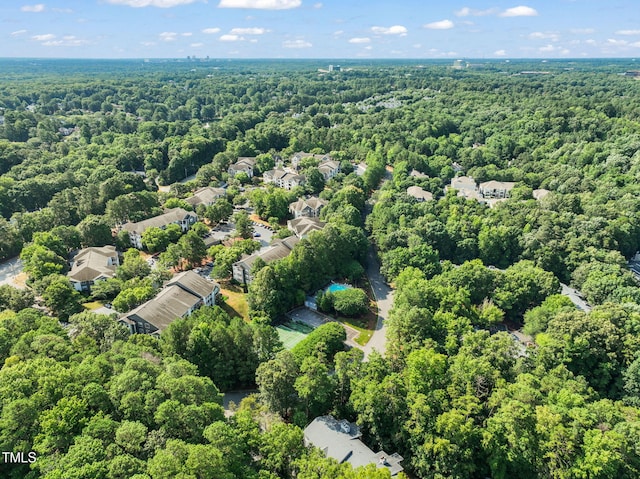 bird's eye view featuring a view of trees